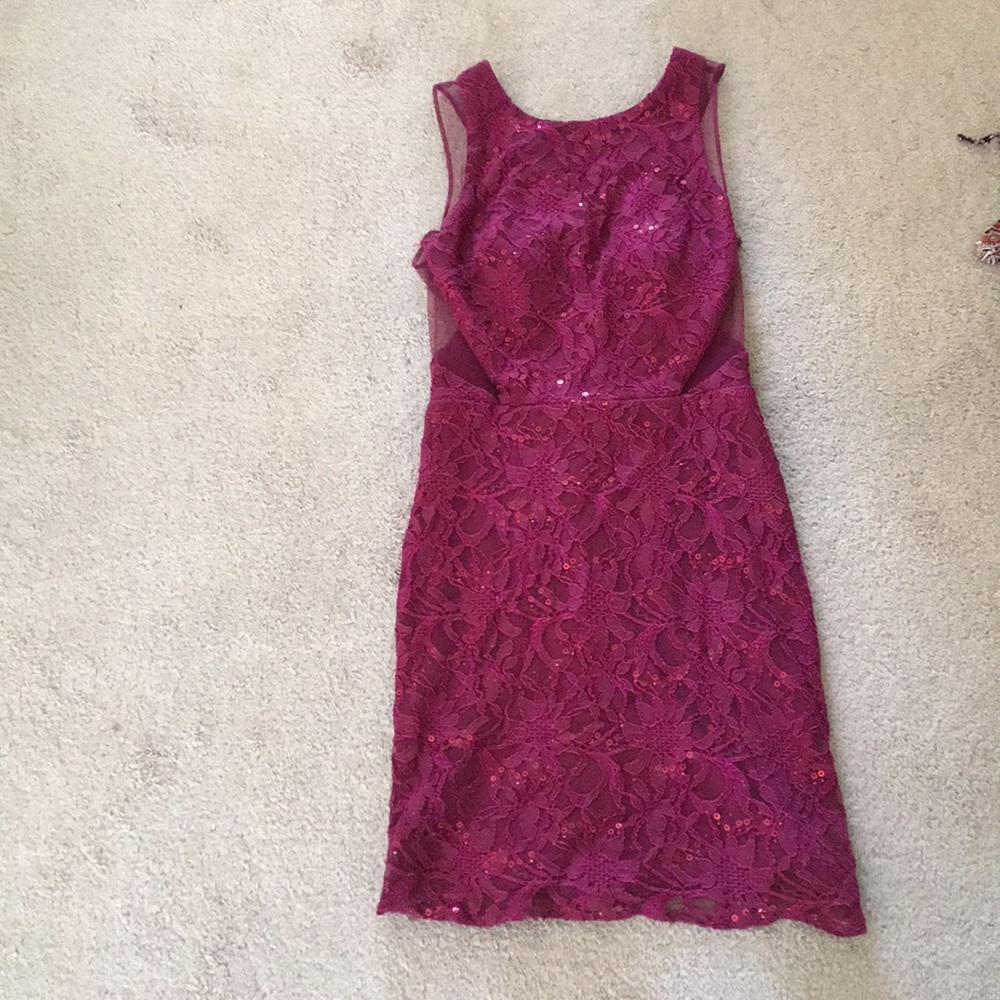 Maroon, sparkly formal dress.